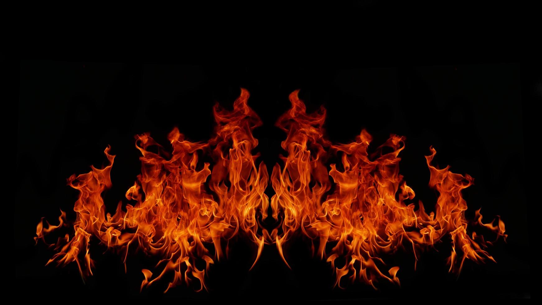 Flame Flame Texture For Strange Shape Fire Background Flame meat that is burned from the stove or from cooking. danger feeling abstract black background Suitable for banners or advertisements. photo