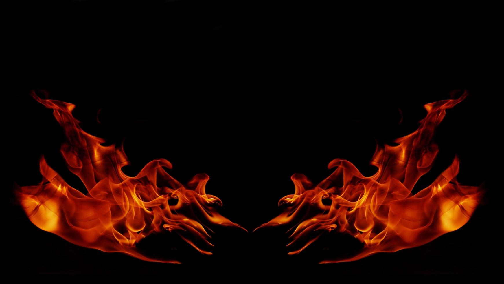 Flame Flame Texture For Strange Shape Fire Background Flame meat that is burned from the stove or from cooking. danger feeling abstract black background Suitable for banners or advertisements. photo