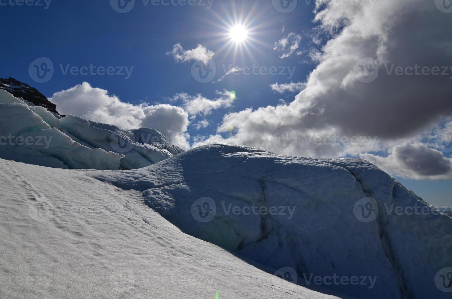 Sun Shining on the Top of an Icelandic Glacier photo