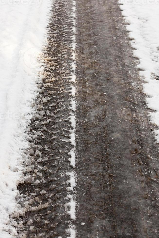 muddy road, winter photo