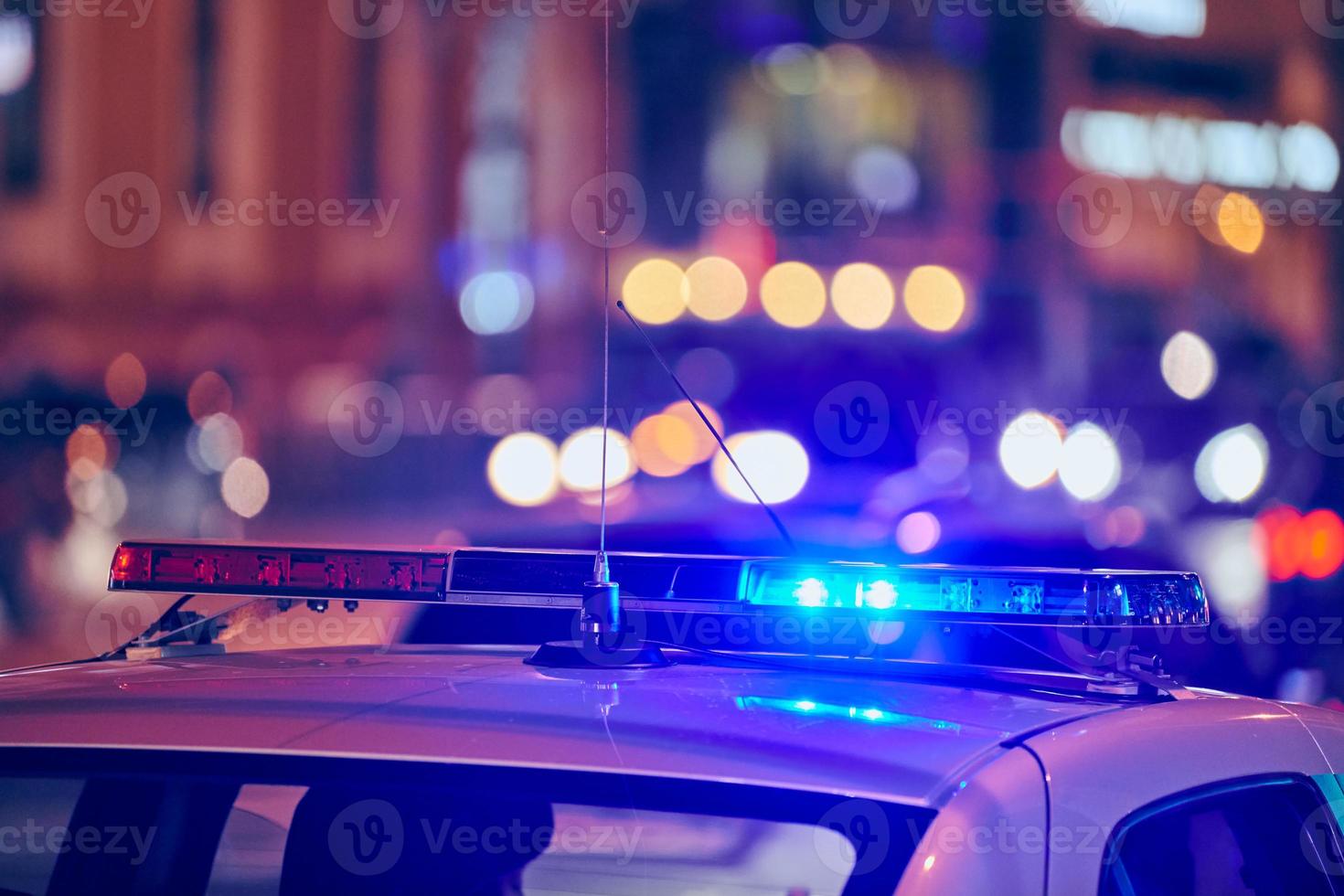 Police car lights at night city street 9755336 Stock Photo at Vecteezy