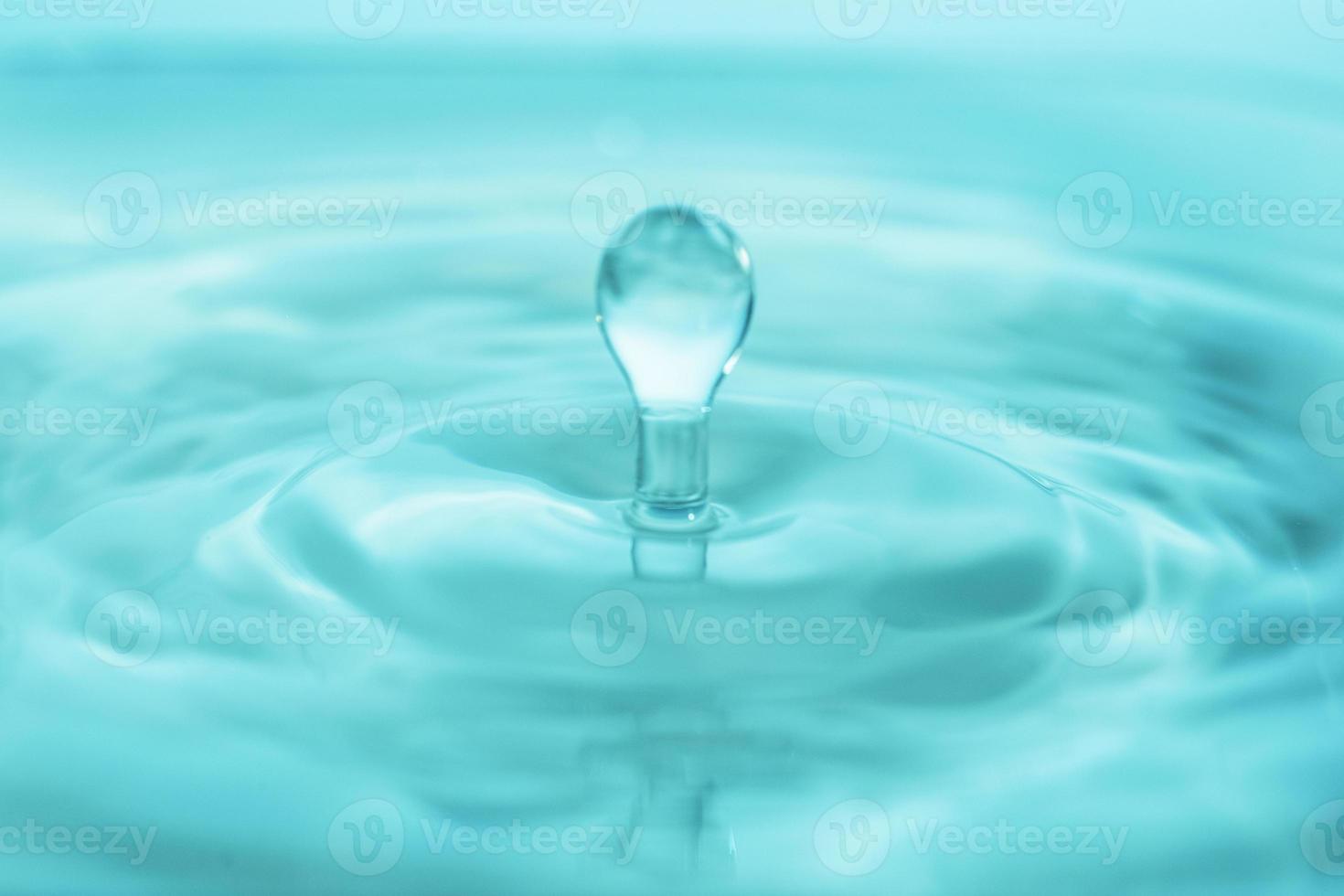 Water drop falling down. photo