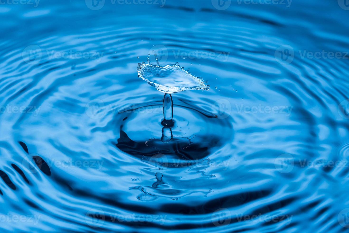 Water drop falling down. photo