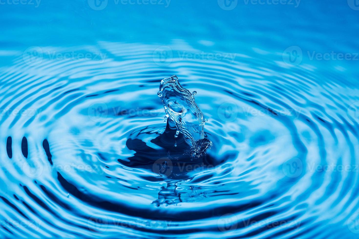 Water drop falling down. photo