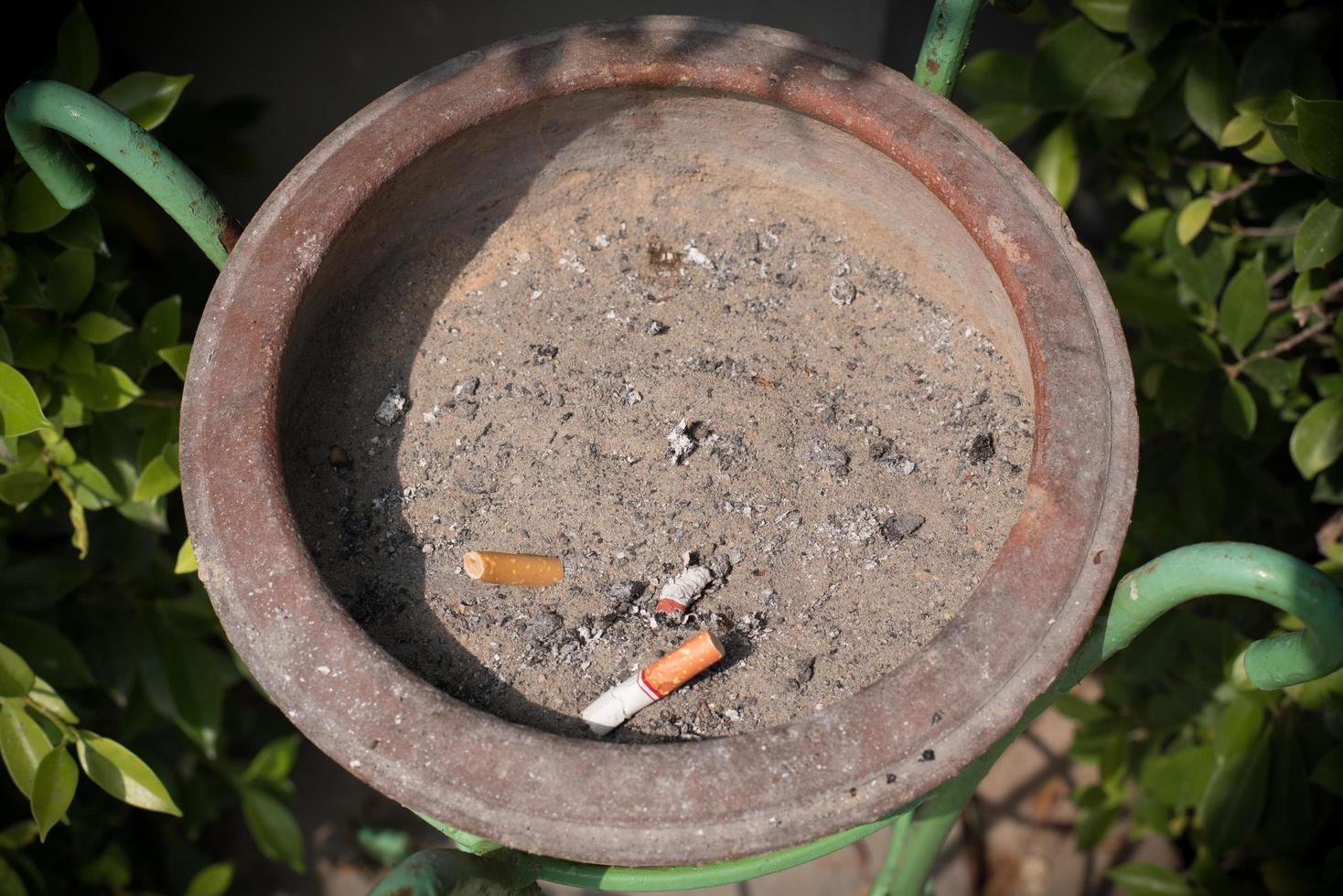A place to throw cigarette butts. photo