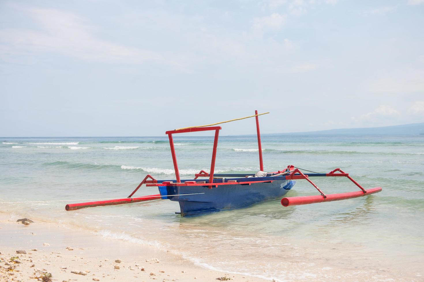Fishng boat at shore photo