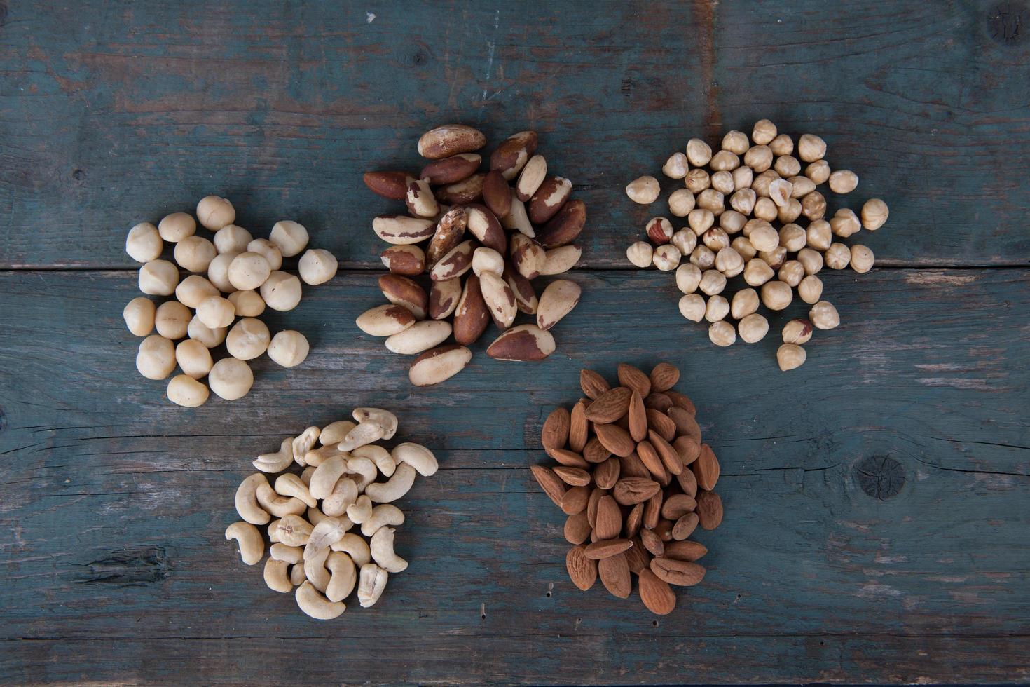 Nuts on wooden background photo