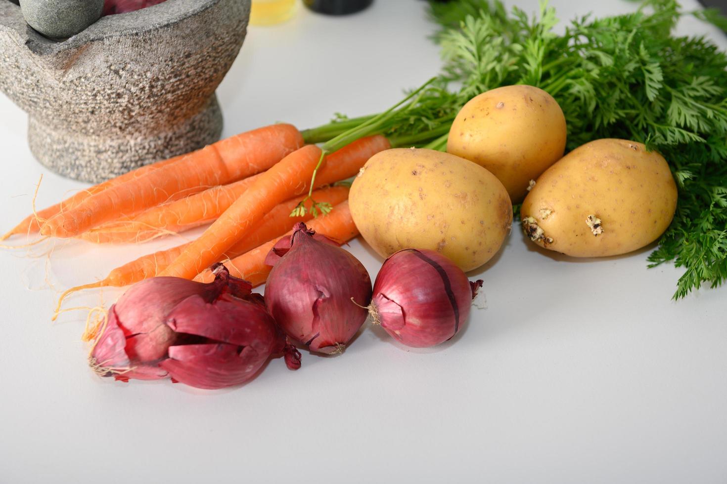 Vegetables on a kitchen table photo