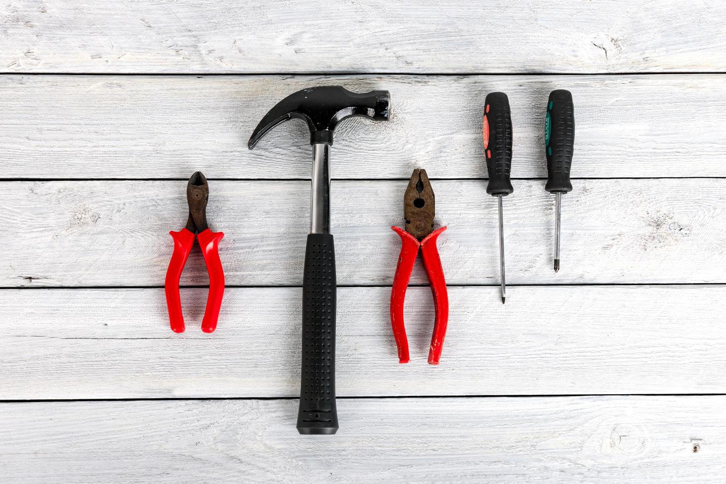 Tools on a wooden background photo