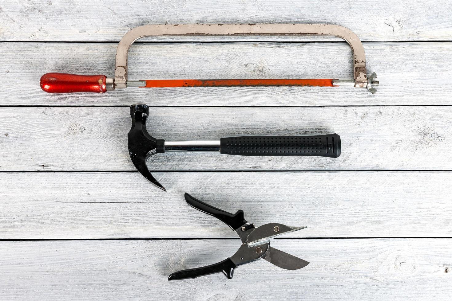 Tools on a wooden background photo