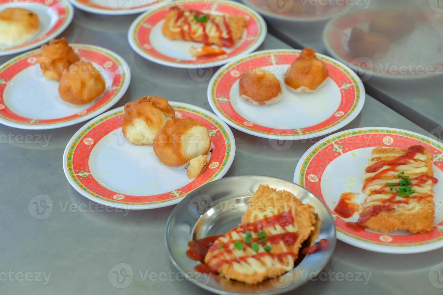 Chinese food dim sum on self service busket tray background. Tradition Dimsum is local food in Songkhla, South of Thailand. photo