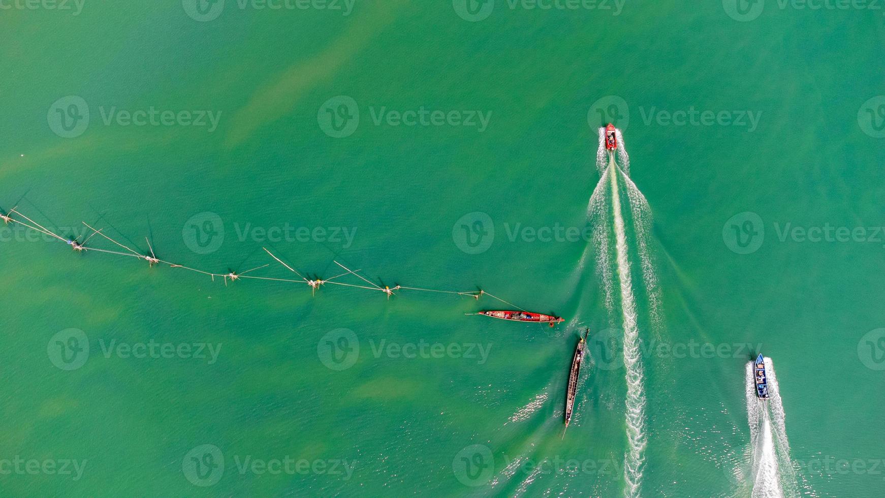 Aerial view of fisherman dock which has many ships anchoring for transport seafood and supplies on island of Songkhla, Thailand photo