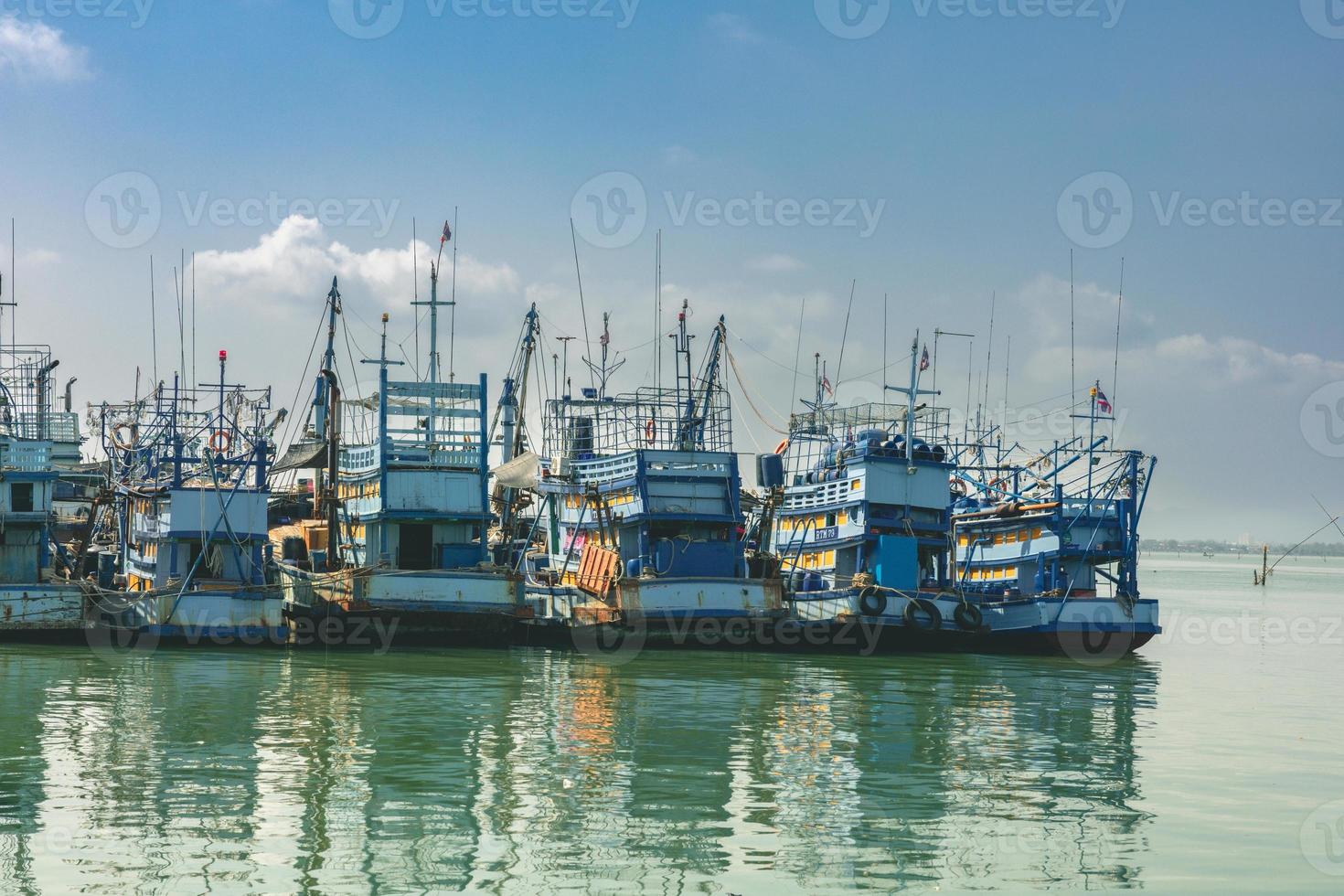 Aerial view of fisherman dock which has many ships anchoring for transport seafood and supplies on island of Songkhla, Thailand photo