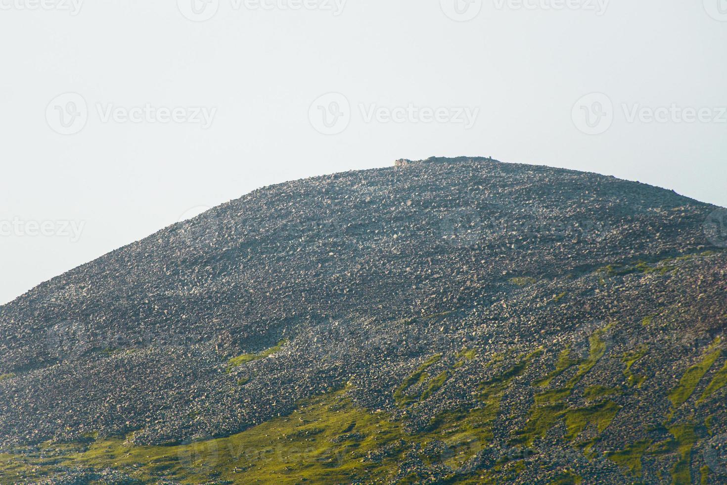 Close up view ruins of Shaori fortress on hilltop by Paravani lake. Sightseeing attraction on Levanis lake trail photo