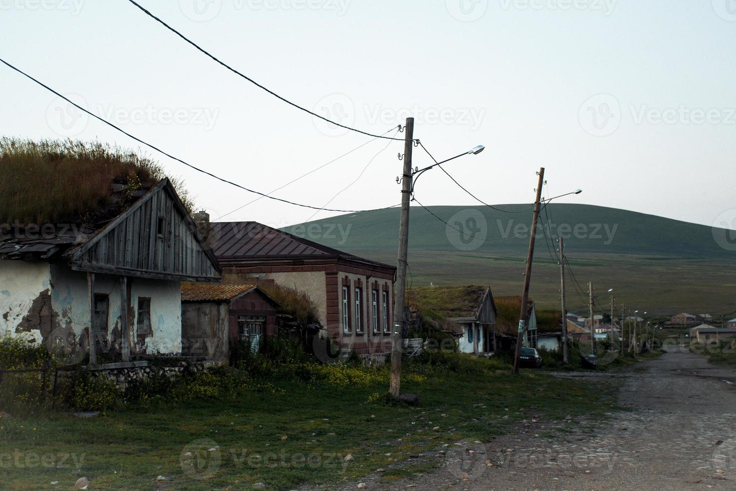 Old traditional house in Tambovka village old house by Paravani lake. Georgia sightseeing hidden gems photo