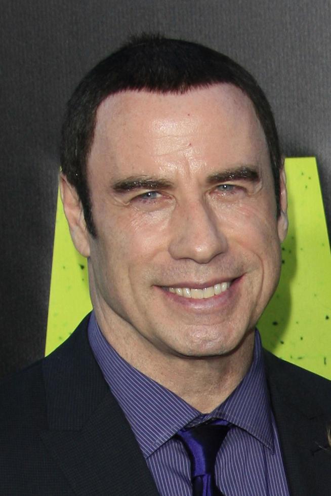 LOS ANGELES, JUN 25 - John Travolta arrives at the Savages Premiere at Village Theater on June 25, 2012 in Westwood, CA photo