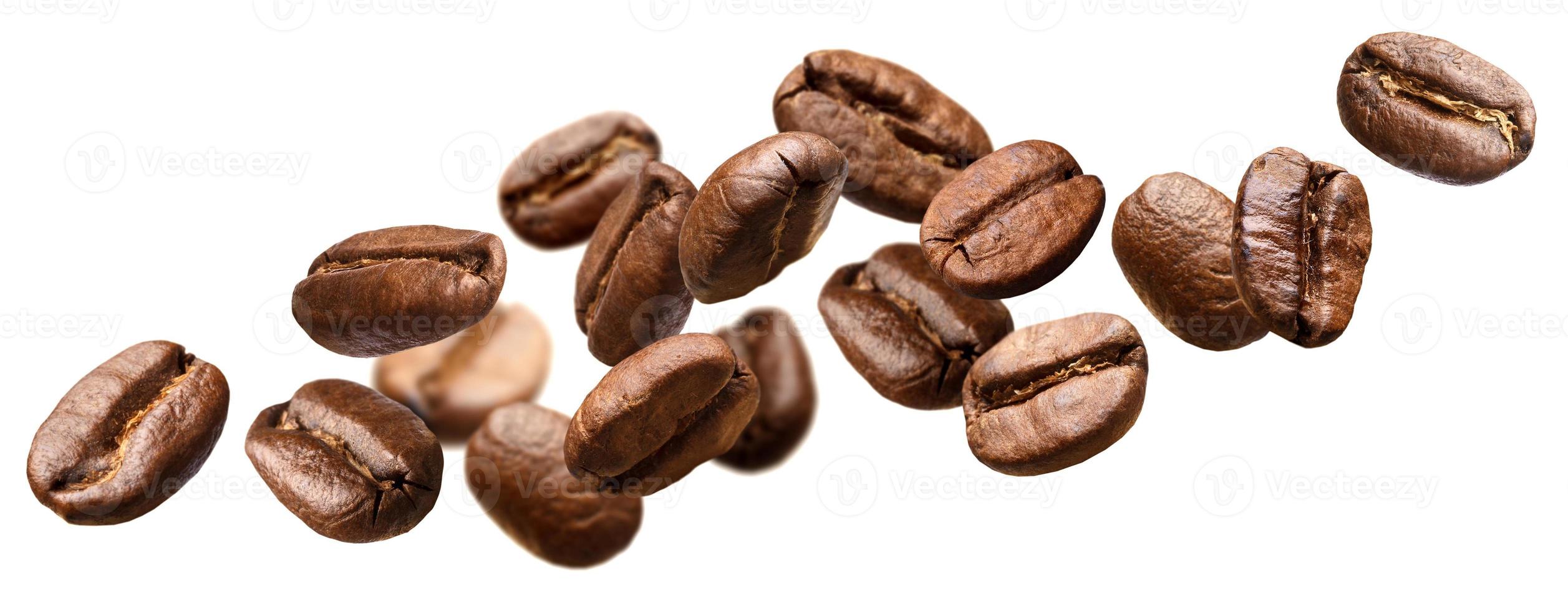 Falling coffee beans isolated on white background photo