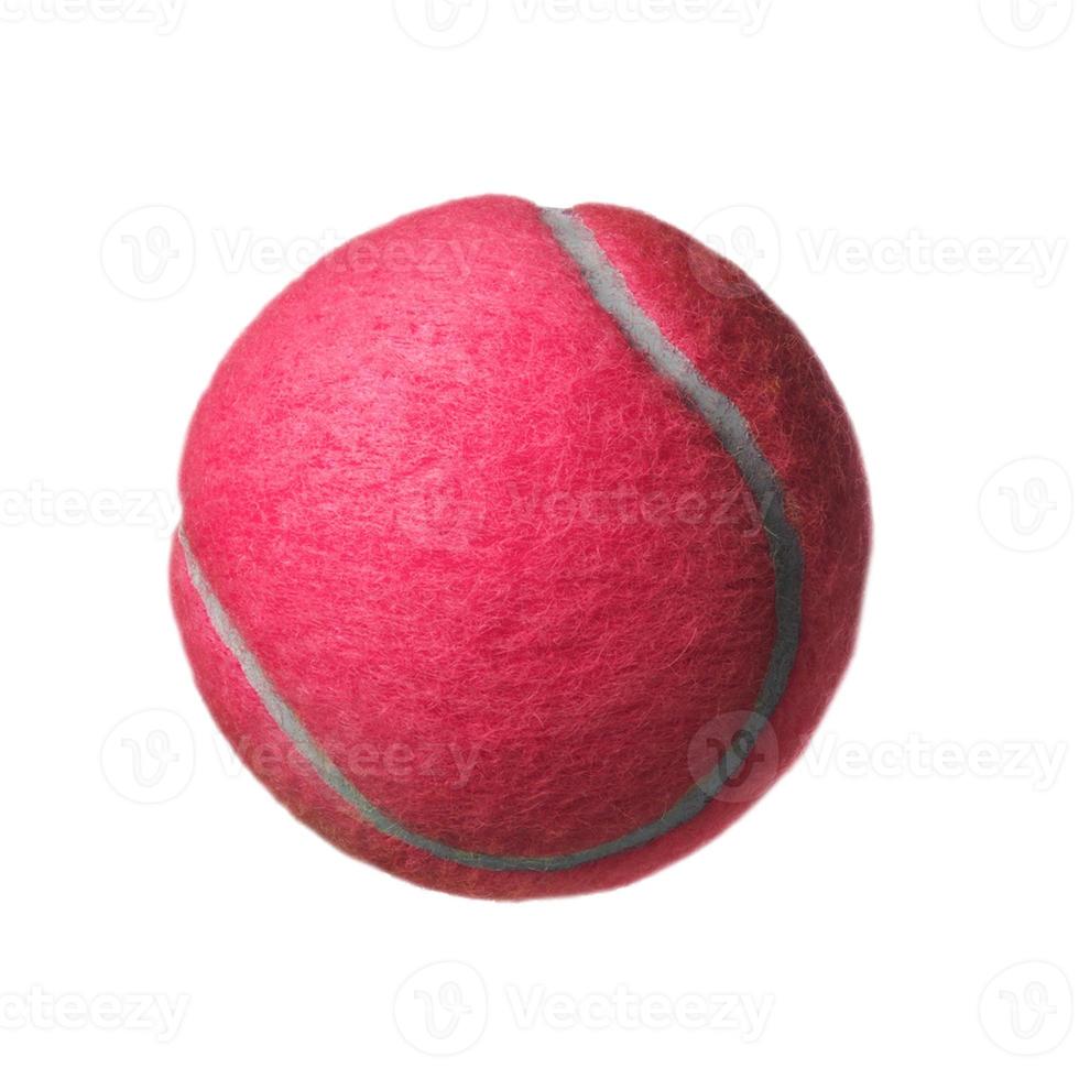 Pink tennis ball isolated on white photo