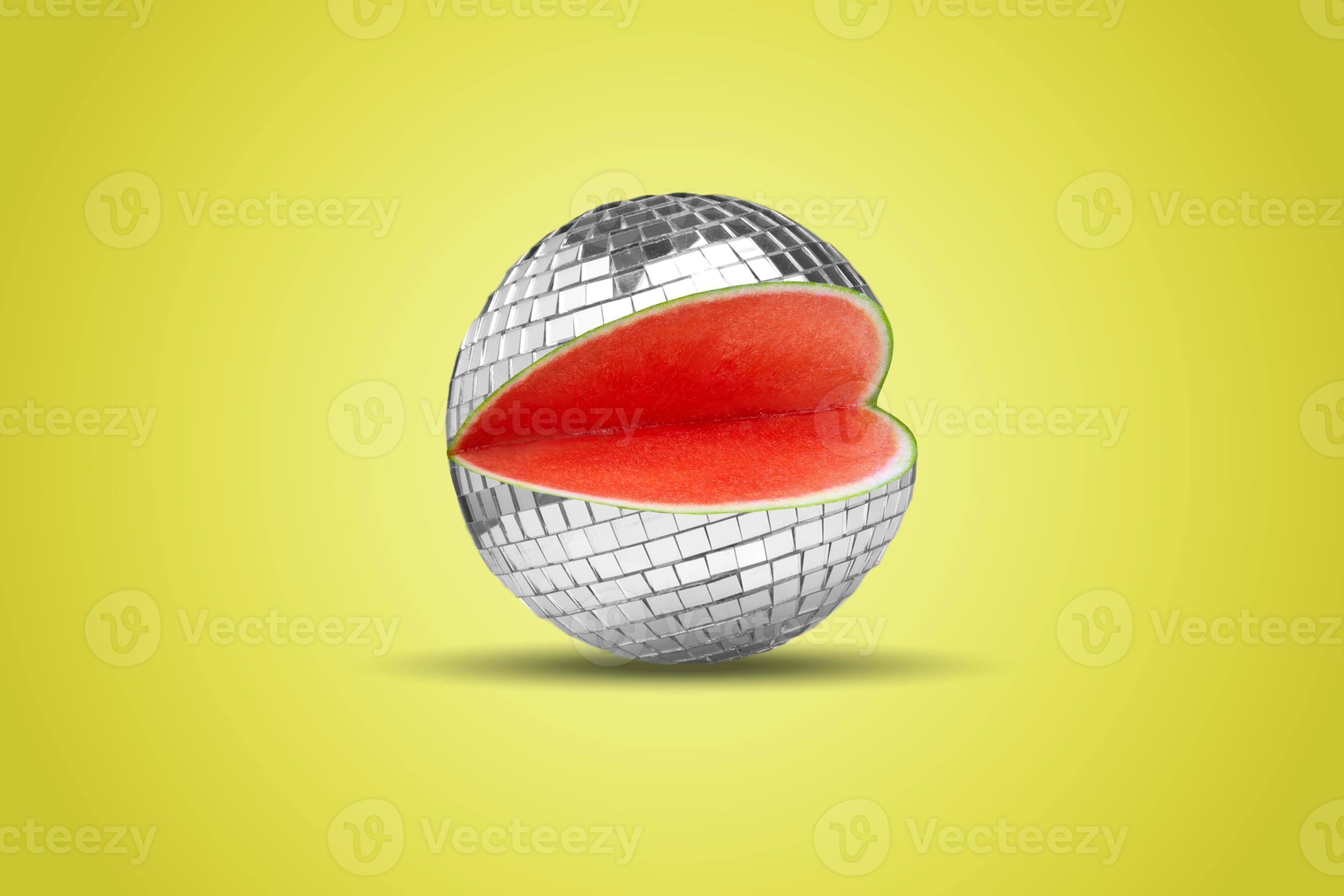 Disco ball like watermelon on yellow background. Modern design. Copy