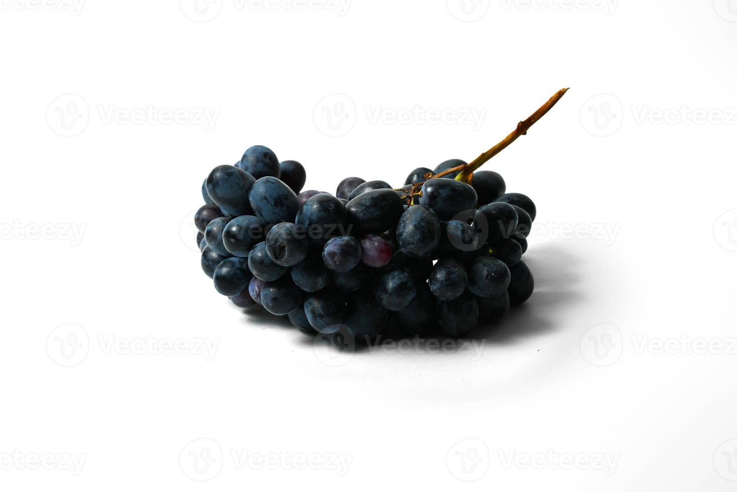 Black grapes isolated on white background photo