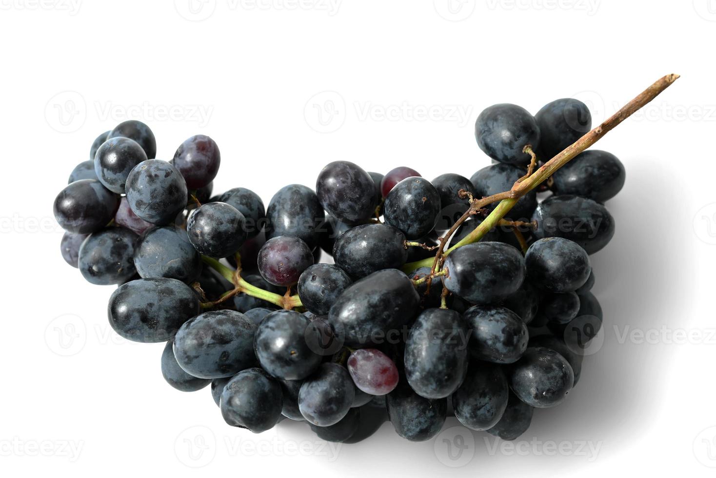 Black grapes isolated on white background photo