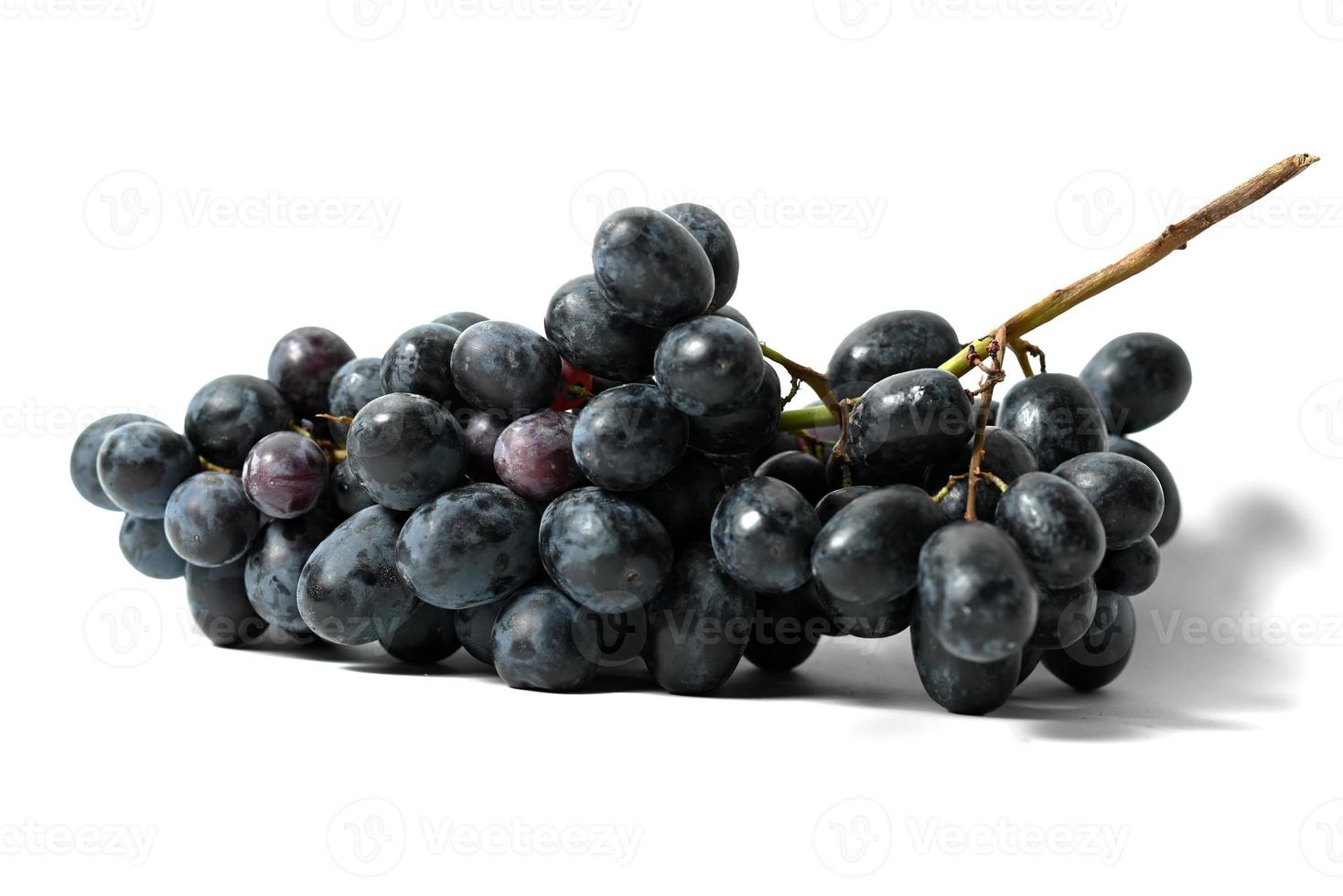 Black grapes isolated on white background photo