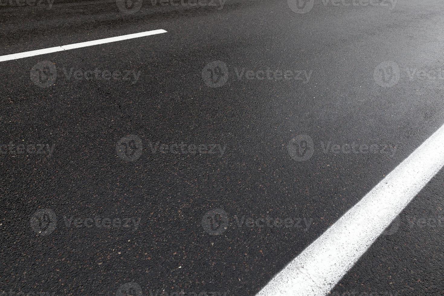 Wet asphalt road photo