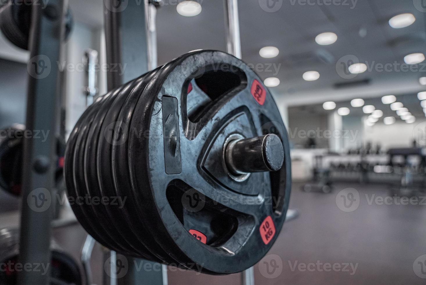 Modern light gym. Sports equipment in gym. photo