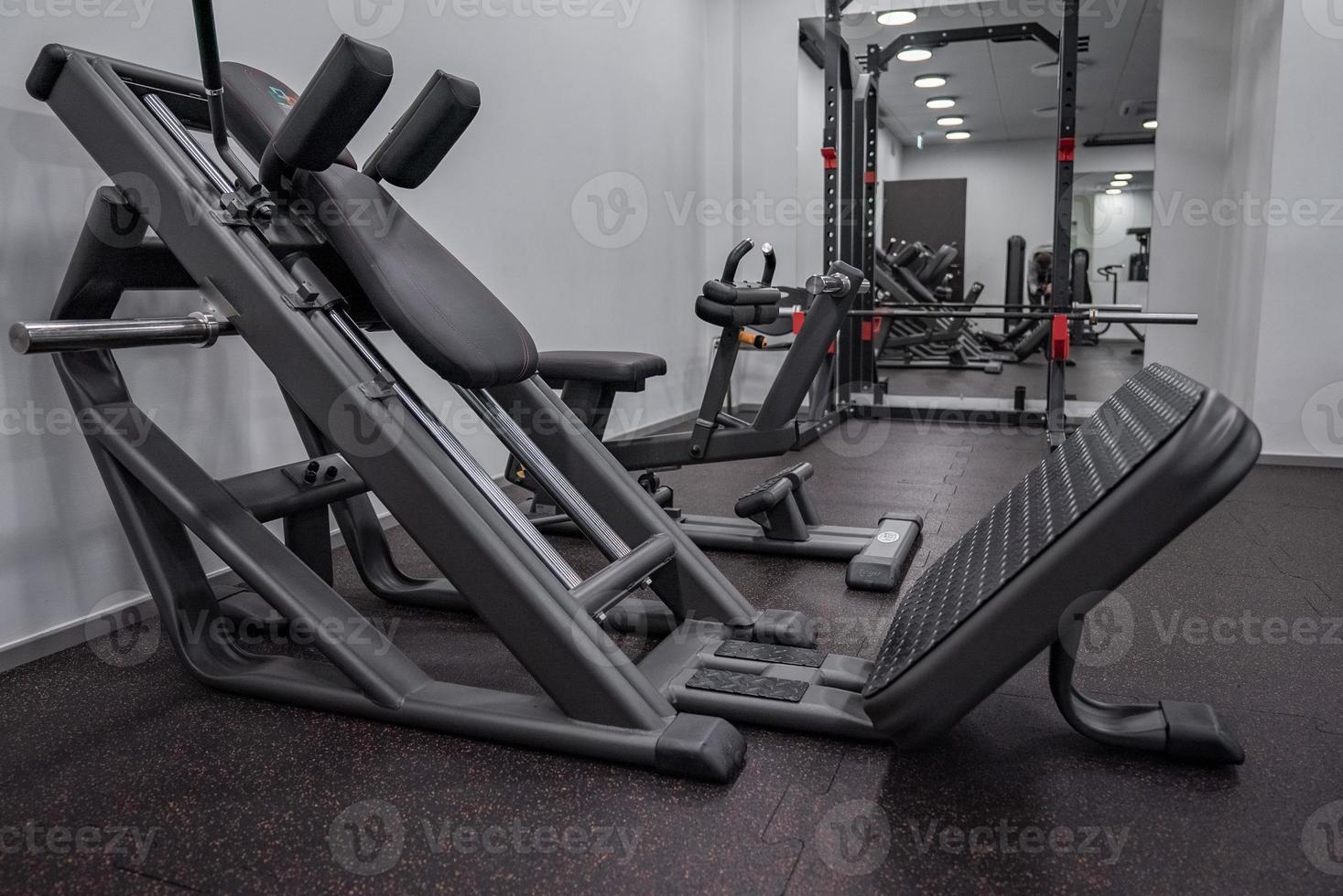 Modern light gym. Sports equipment in gym. photo