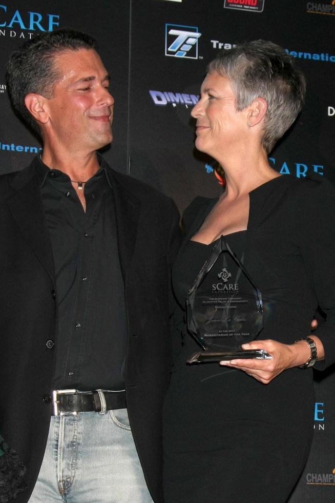 LOS ANGELES, OCT 30 - Malek Akkad, Jamie Lee Curtis at the sCare Foundation Halloween Launch Benefit at Conga Room  LA Live on October 30, 2011 in Los Angeles, CA photo