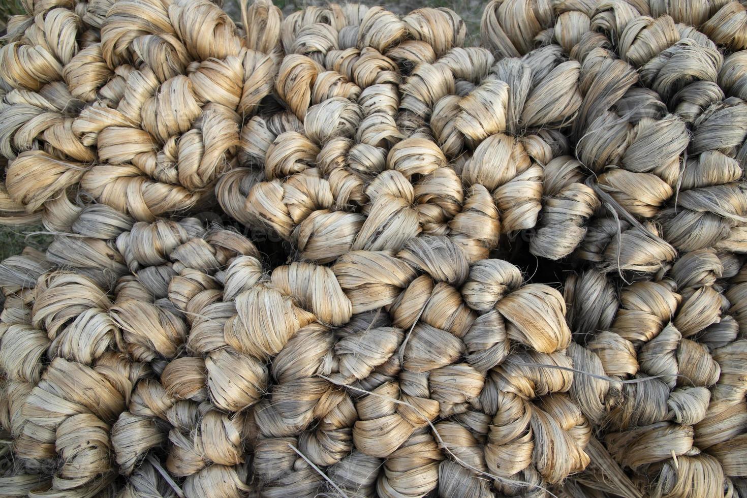thick brown bundle of raw jute fiber Texture Background photo