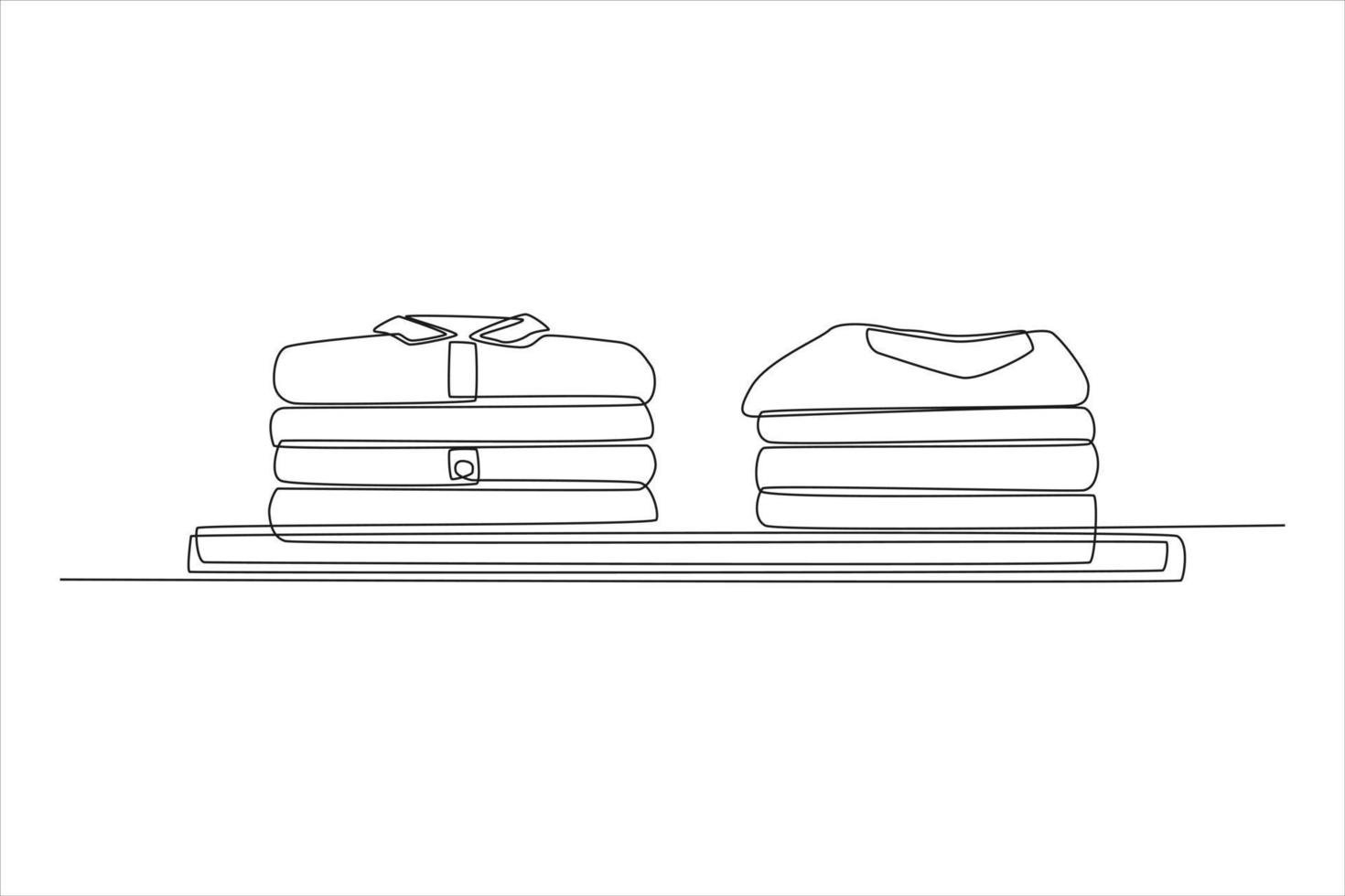 Continuous one line drawing modern shirts neatly stacked in a pile. Laundry service concept. Single line draw design vector graphic illustration.