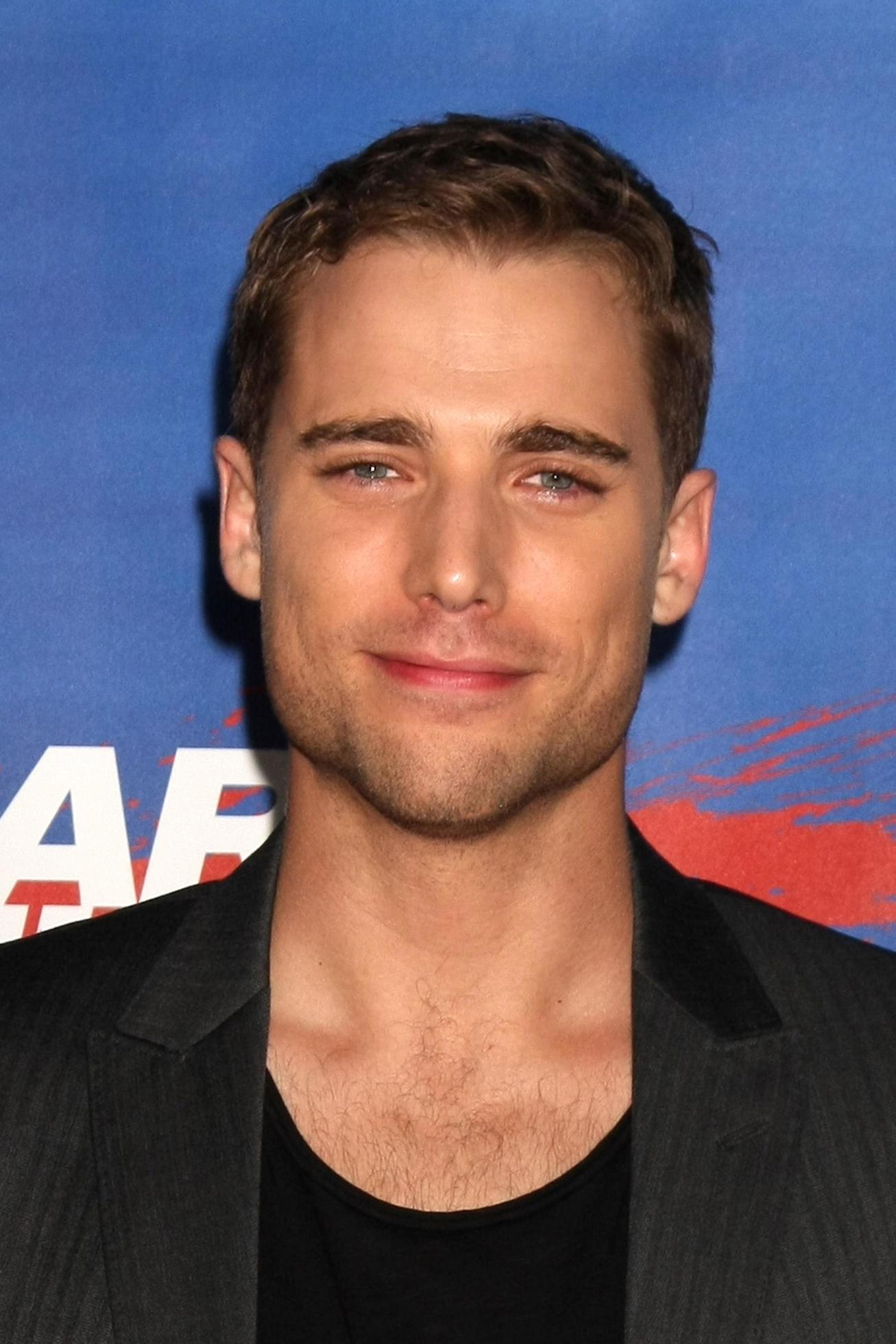 LOS ANGELES, SEP 1 Dustin Milligan arriving at the Shark Night