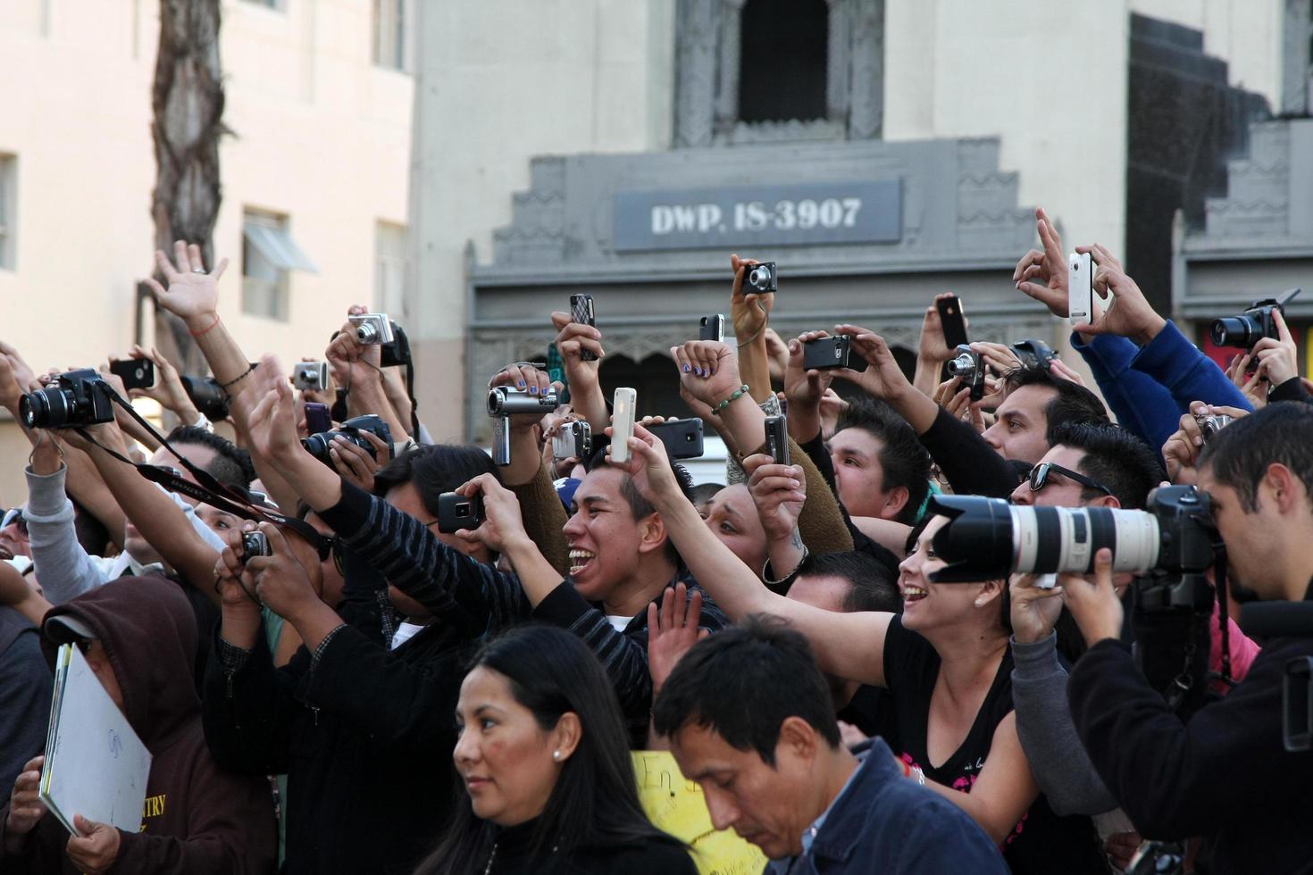 LOS ANGELES, NOV 8 - Fans at the Hollywood Walk of Fame Ceremony bestowing a star on Shakira at W Hollywood on November 8, 2011 in Los Angeles, CA photo