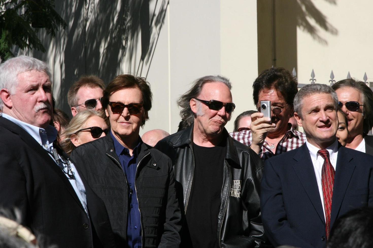 LOS ANGELES, FEB 9 - Paul McCartney, Neil Young at the Hollywood Walk of Fame Ceremony for Paul McCartney at Capital Records Building on February 9, 2012 in Los Angeles, CA photo