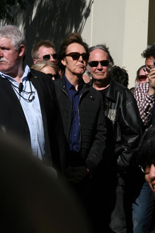 LOS ANGELES, FEB 9 - Paul McCartney, Neil Young at the Hollywood Walk of Fame Ceremony for Paul McCartney at Capital Records Building on February 9, 2012 in Los Angeles, CA photo