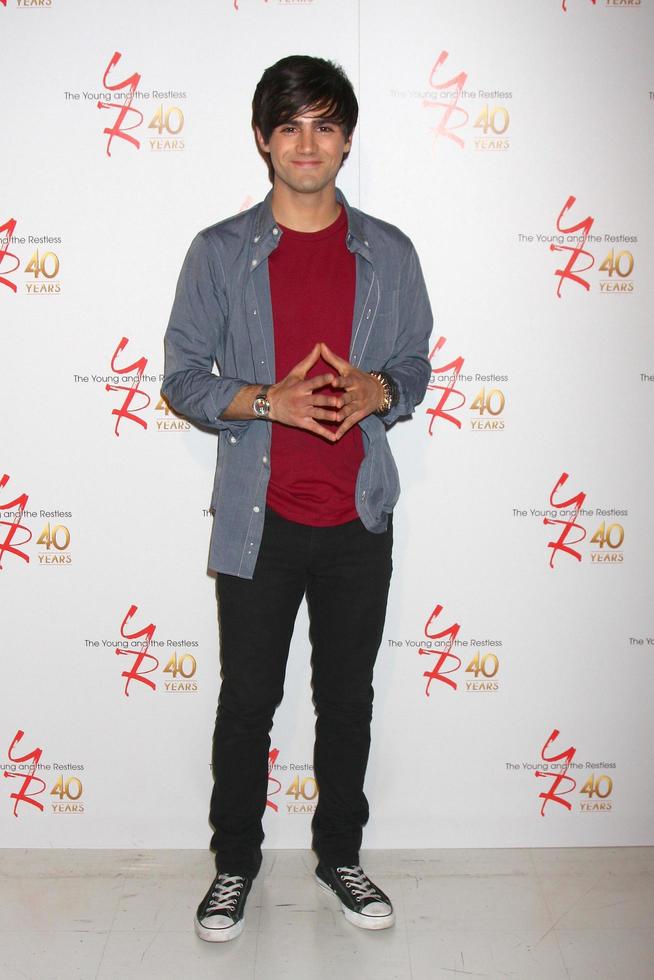 LOS ANGELES, MAR 26 - Max Ehrich attends the 40th Anniversary of the Young and the Restless Celebration at the CBS Television City on March 26, 2013 in Los Angeles, CA photo