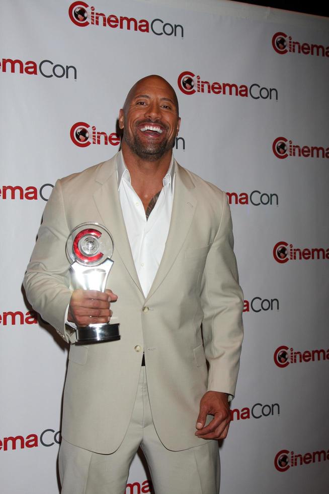 LAS VEGAS, APR 23 - Dwayne Johnson arrives at the Paramount Studios Presentation at CinemaCom 2012 at Caesars Palace on April 23, 2012 in Las Vegas, NV photo