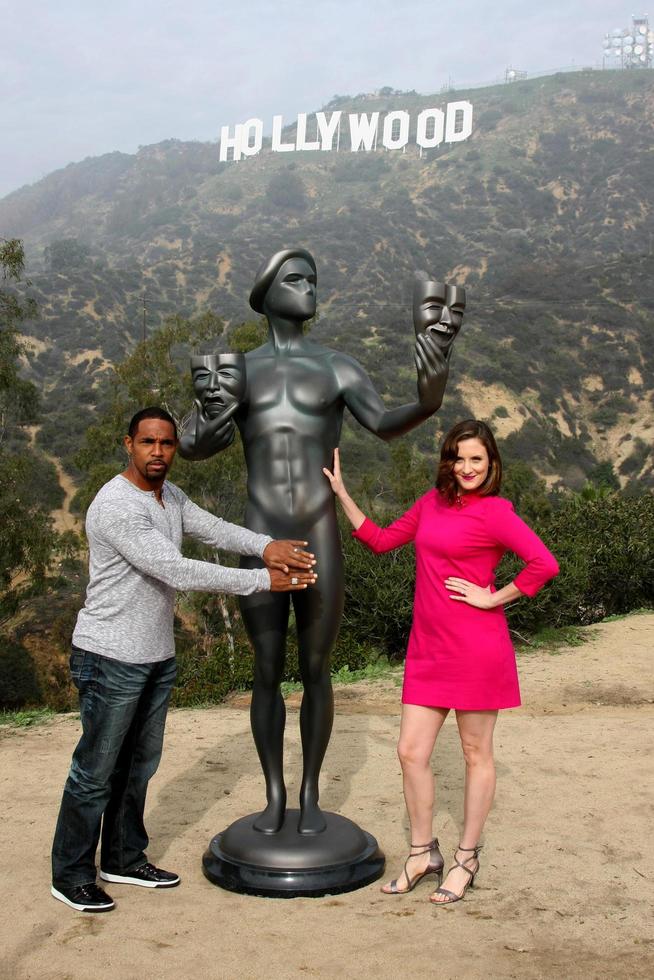 LOS ANGELES, JAN 20 - Jason George, Screen Actor s Guild Actor, Julie Lake at the AG Awards Actor Visits The Hollywood Sign at a Hollywood Hills on January 20, 2015 in Los Angeles, CA photo