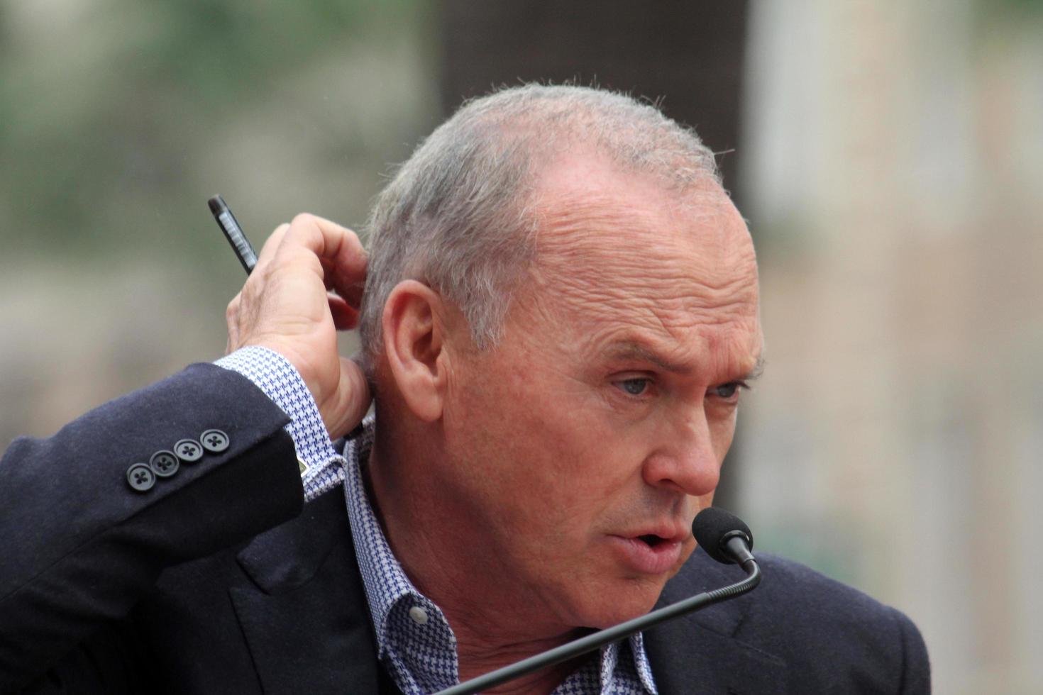 LOS ANGELES, DEC 10 - Michael Keaton at the Ron Howard Star on the Hollywood Walk of Fame at the Hollywood Blvd on December 10, 2015 in Los Angeles, CA photo