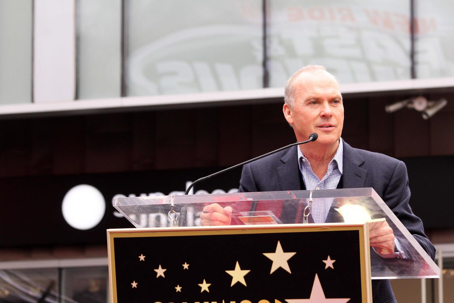 LOS ANGELES, DEC 10 - Michael Keaton at the Ron Howard Star on the Hollywood Walk of Fame at the Hollywood Blvd on December 10, 2015 in Los Angeles, CA photo
