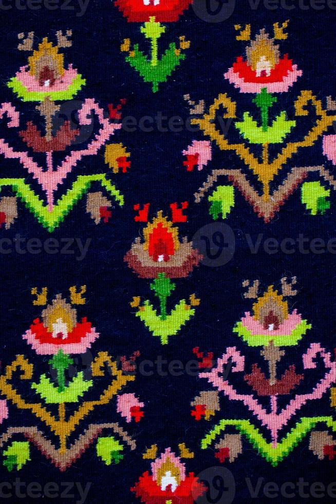 Romanian folk seamless pattern ornaments. Romanian traditional embroidery. Ethnic texture design. Traditional carpet design. Carpet ornaments. Rustic carpet design photo