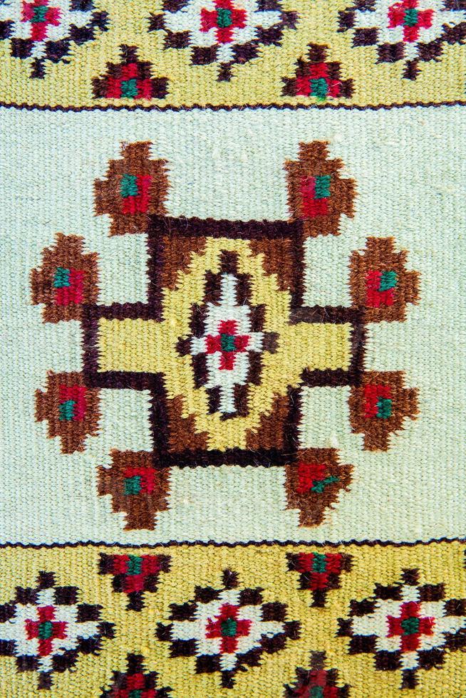 Romanian folk seamless pattern ornaments. Romanian traditional embroidery. Ethnic texture design. Traditional carpet design. Carpet ornaments. Rustic carpet design photo