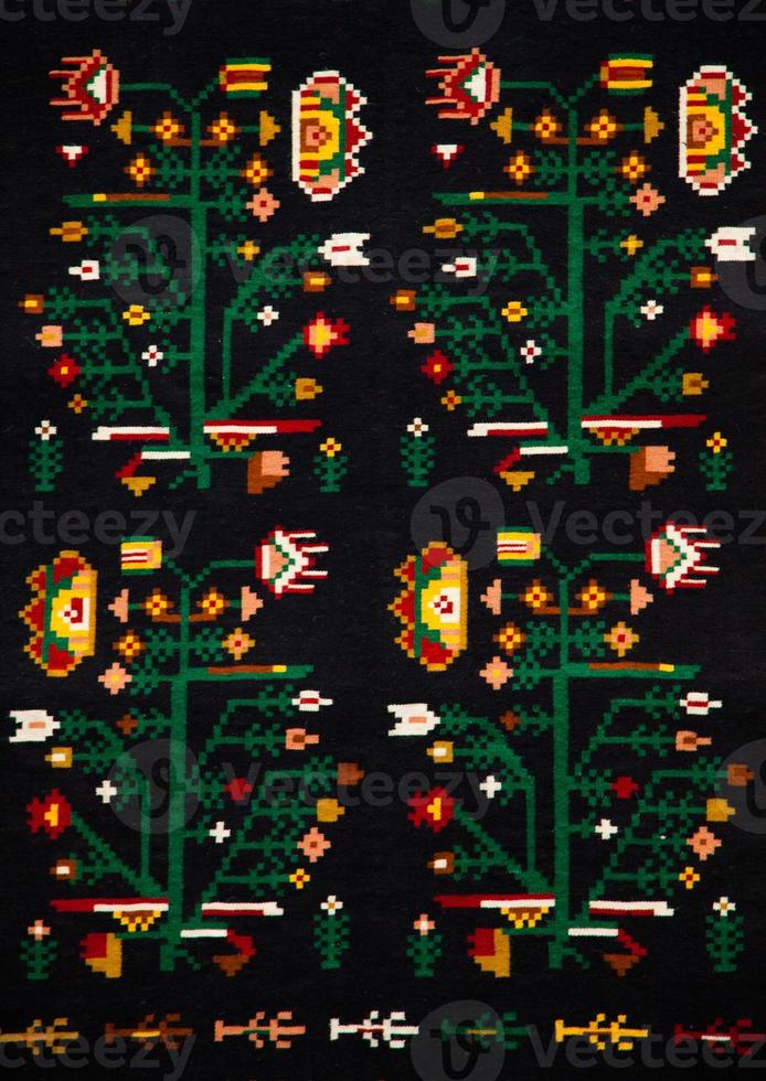 Romanian folk seamless pattern ornaments. Romanian traditional embroidery. Ethnic texture design. Traditional carpet design. Carpet ornaments. Rustic carpet design photo