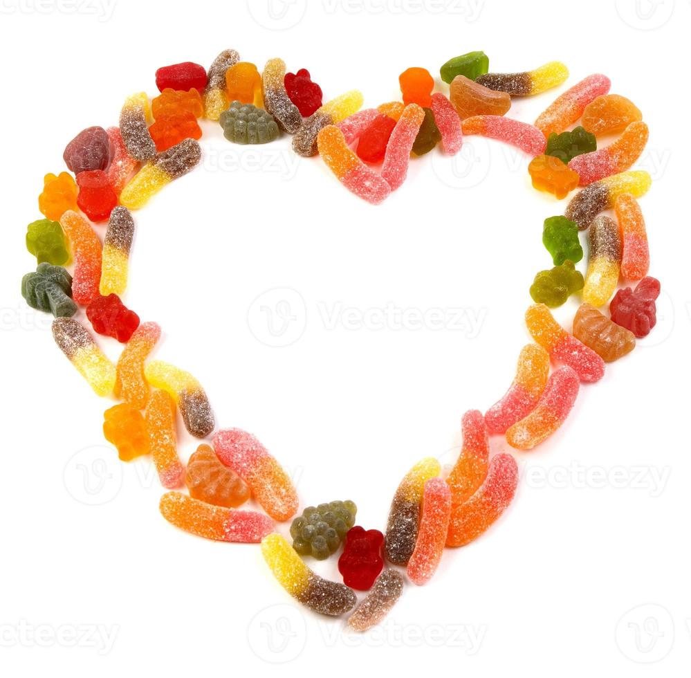 Heart of multicolored marmalade candy on a white background. photo