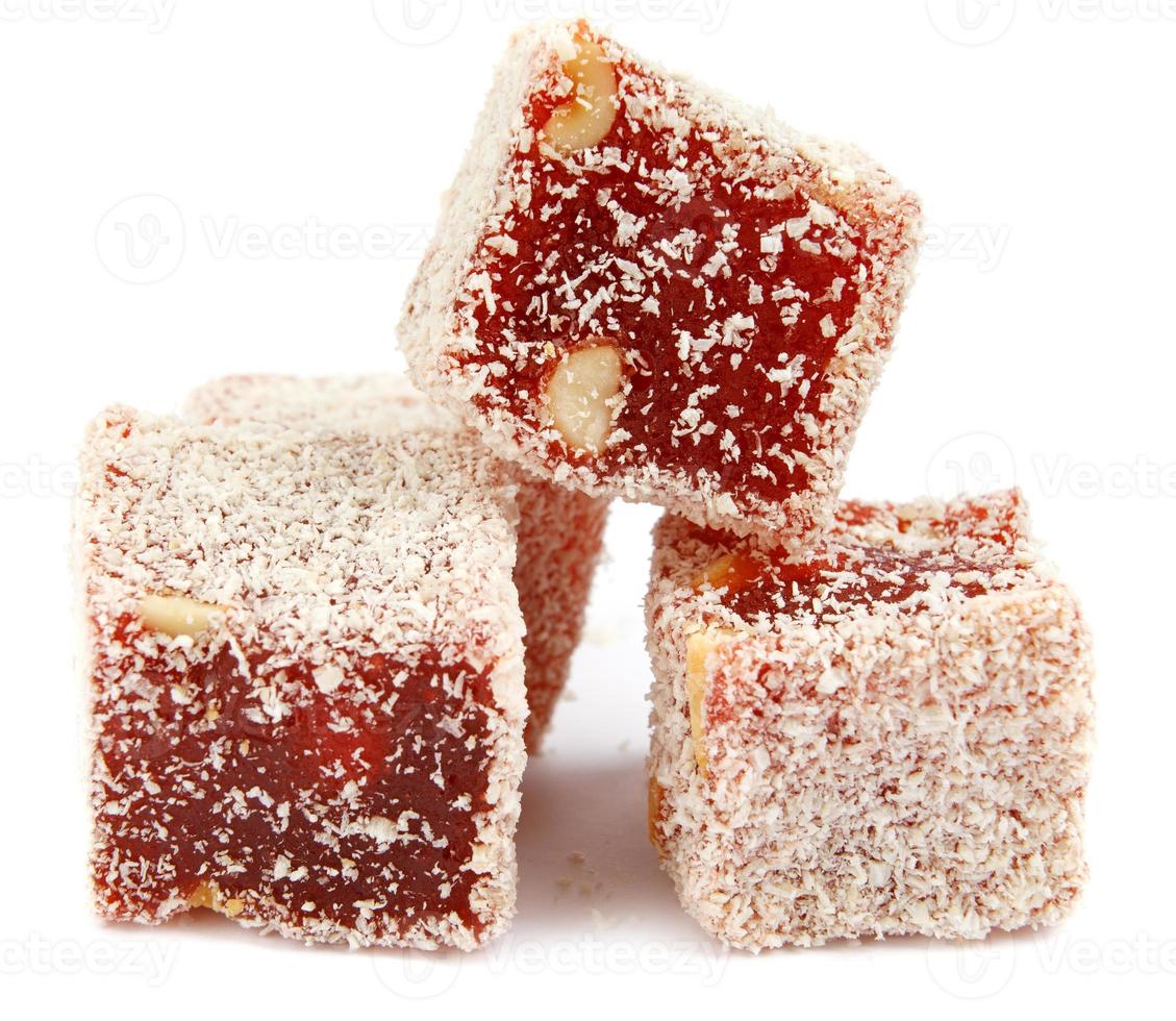 turkish delight. traditional sweets, rahat lukum . isolated on a white background. photo