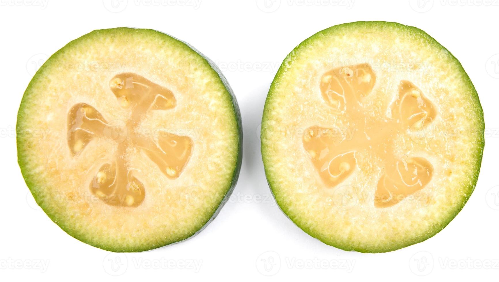 Background from sections of the ripe feijoa fruit. photo