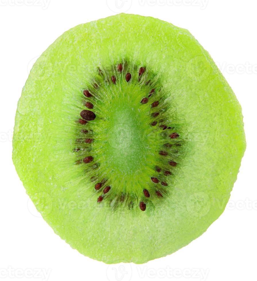The dried kiwi slice is isolated on a white background. photo