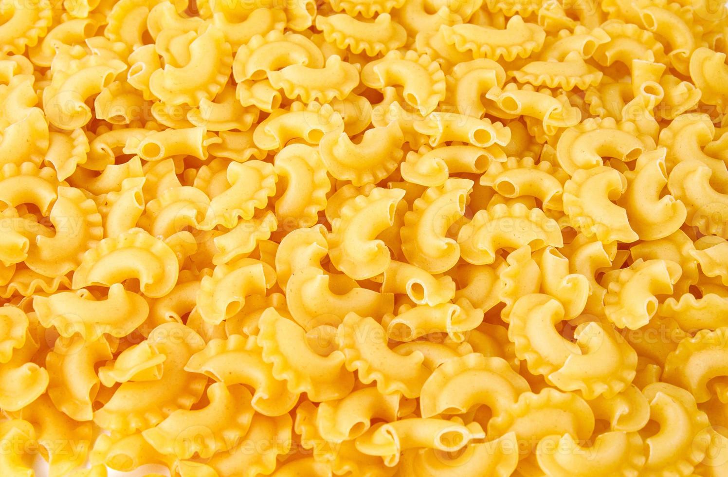 Pasta background. The pasta is filled with an even layer. photo