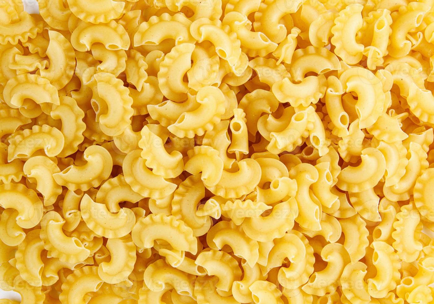 Pasta background. The pasta is filled with an even layer. photo